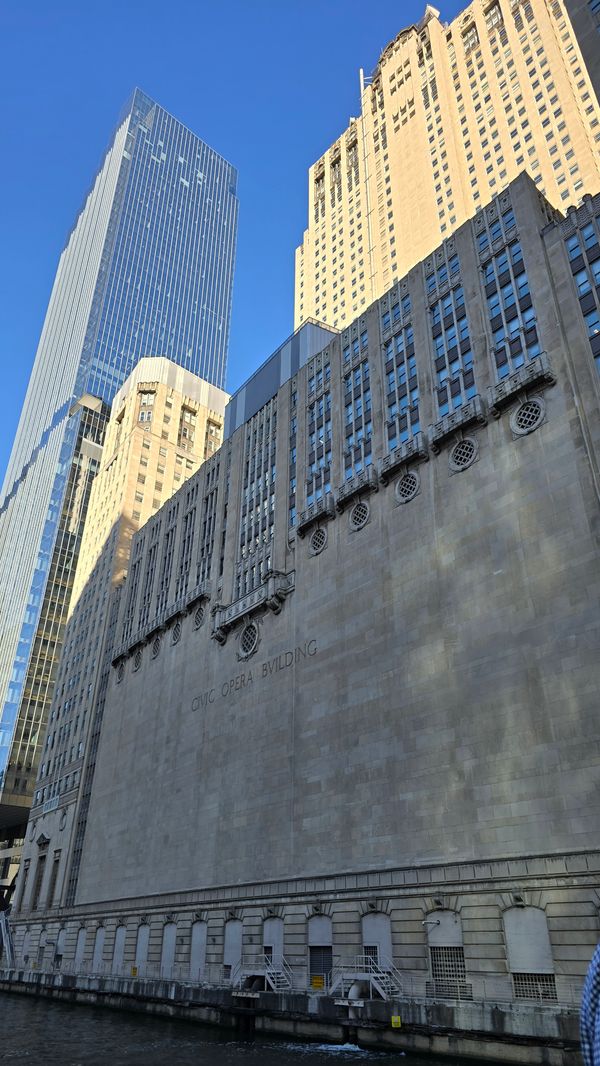 The Civic Opera building shot from a boat on the Chicago River